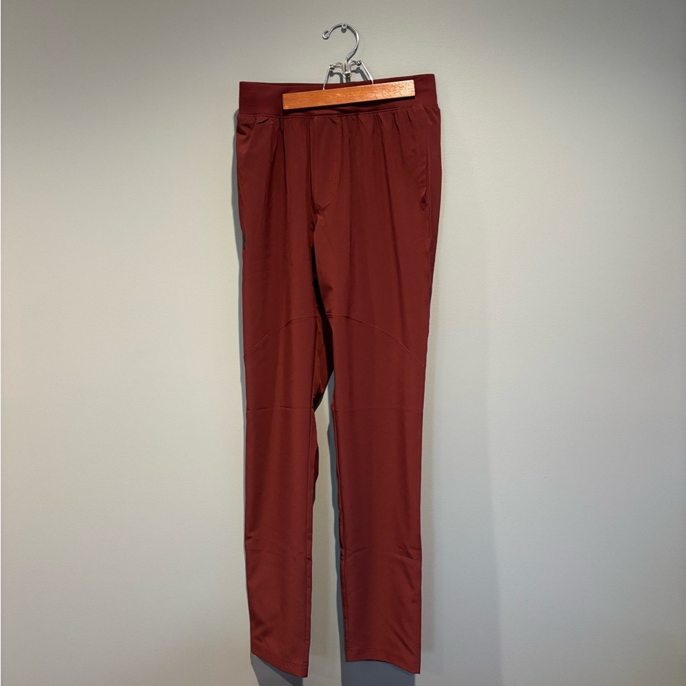 Men's UA stretch woven pant size small